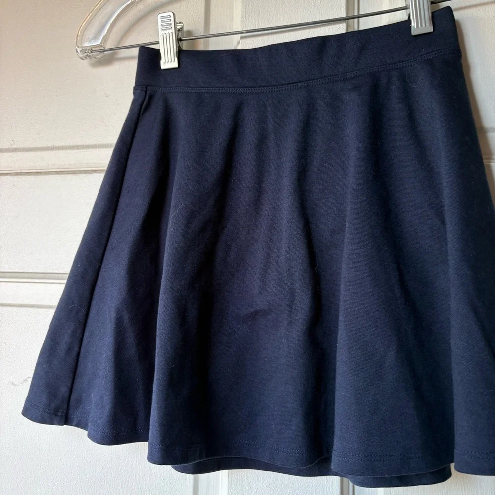 Place Classic Navy Blue Kids pleated uniform Skirt. SB3